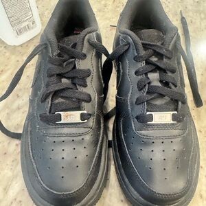 Nike Kids Black Sneakers with Silver Accents